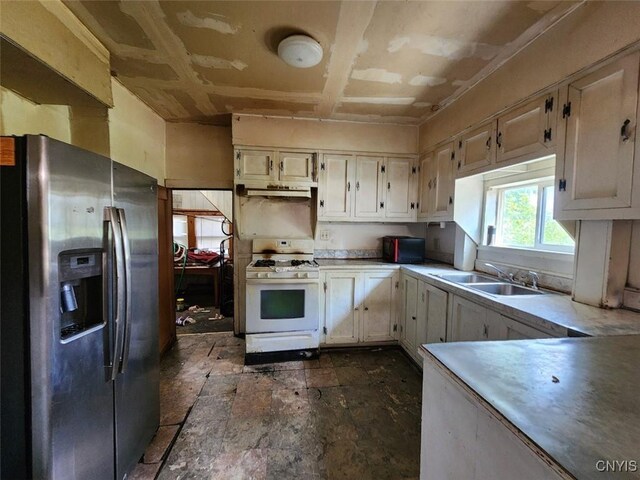 312 Richmond Ave Unit 314, Syracuse, NY 13204 - kitchen featuring stainless steel fridge with ice dispenser, gas range gas stove, exhaust hood, and light countertops