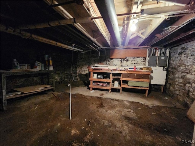 312 Richmond Ave Unit 314, Syracuse, NY 13204 - unfinished below grade area featuring a workshop area and electric panel