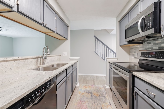 134 Jordache Ln, Ogden, NY 14559 - kitchen featuring appliances with stainless steel finishes and gray cabinets