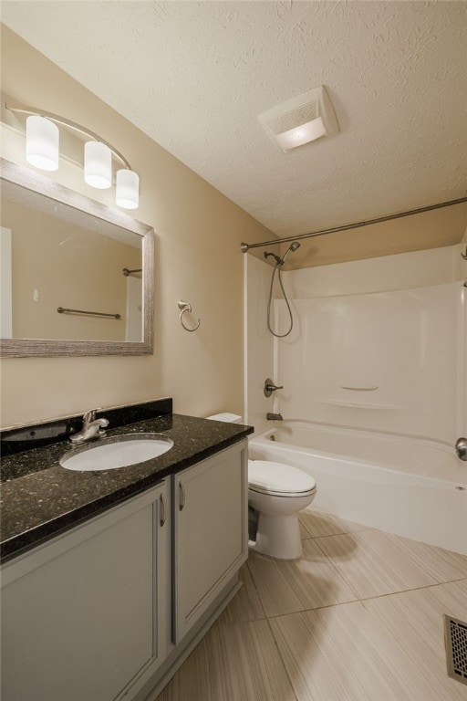 134 Jordache Ln, Ogden, NY 14559 - bathroom with vanity, shower / bath combination, a textured ceiling, and tile patterned flooring