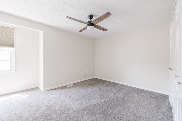 134 Jordache Ln, Ogden, NY 14559 - carpeted empty room with ceiling fan and baseboards