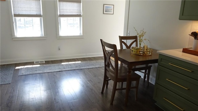 164 S Fitzhugh St, Rochester, NY 14608 - dining room with dark wood-style flooring
