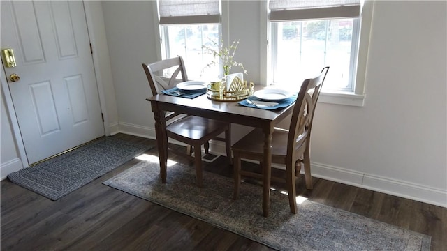 164 S Fitzhugh St, Rochester, NY 14608 - dining area with wood finished floors and baseboards