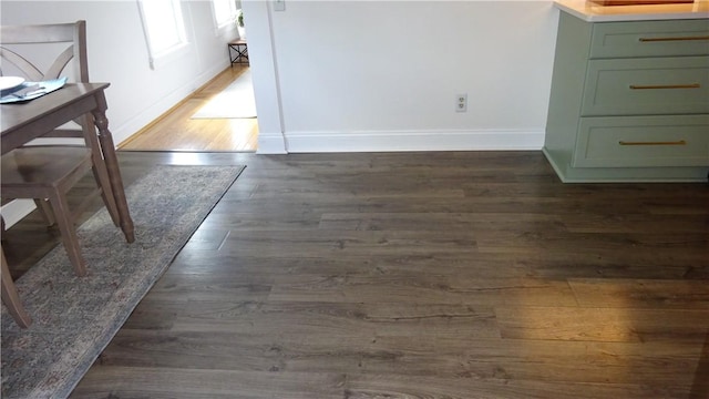 164 S Fitzhugh St, Rochester, NY 14608 - detailed view of baseboards and wood finished floors