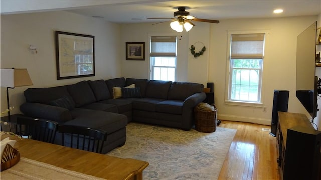 164 S Fitzhugh St, Rochester, NY 14608 - living area featuring healthy amount of natural light, a ceiling fan, light wood-style floors, and recessed lighting