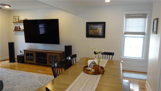 164 S Fitzhugh St, Rochester, NY 14608 - dining room featuring wood finished floors and recessed lighting