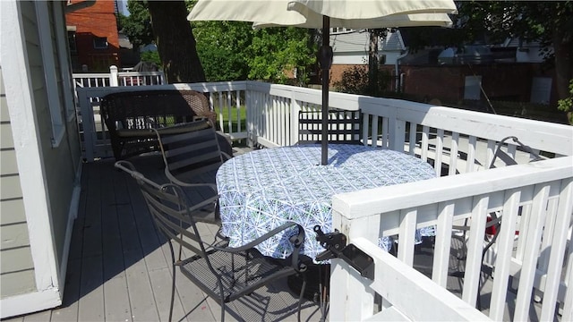 164 S Fitzhugh St, Rochester, NY 14608 - wooden terrace with outdoor dining space