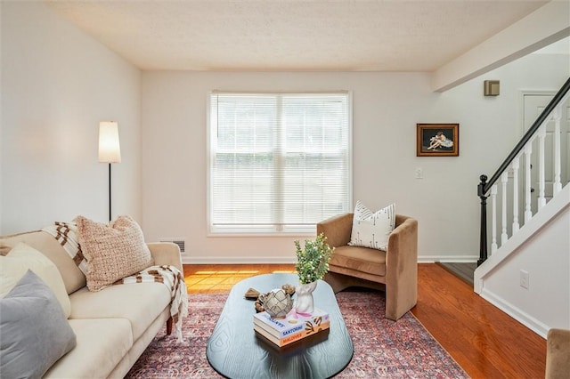 45 Hazel Bark, Gates, NY 14606 - living area with stairway and wood finished floors
