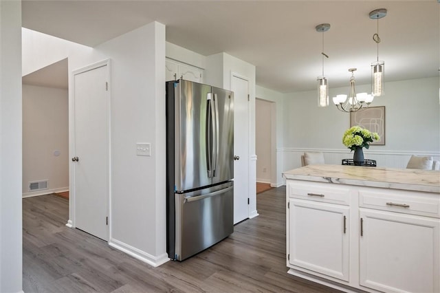 45 Hazel Bark, Gates, NY 14606 - kitchen with freestanding refrigerator, dark wood-style floors, white cabinetry, and light countertops
