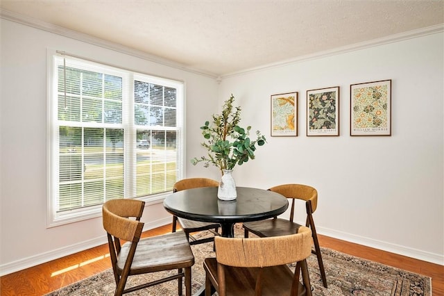 45 Hazel Bark, Gates, NY 14606 - dining space featuring crown molding and wood finished floors