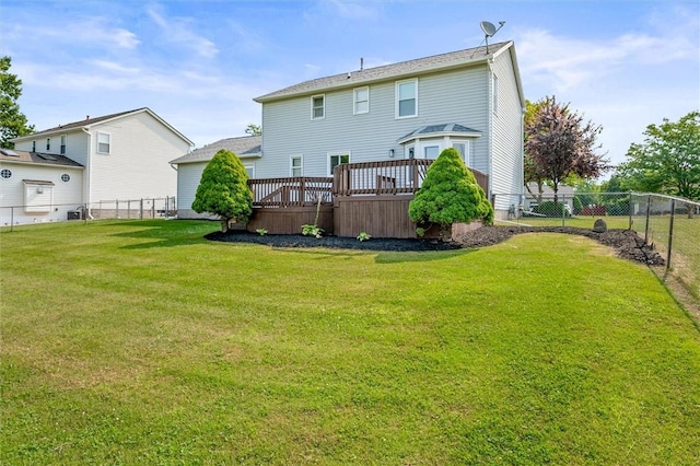 45 Hazel Bark, Gates, NY 14606 - rear view of house with a deck and a fenced backyard