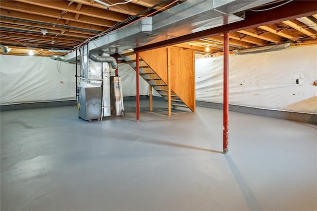 45 Hazel Bark, Gates, NY 14606 - unfinished basement with heating unit, stairs, and water heater