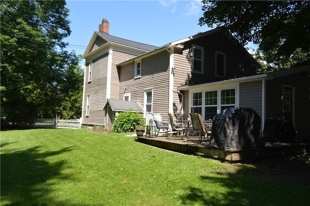 132 Main St, Unadilla, NY 13849 - rear view of house featuring a chimney