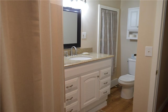 132 Main St, Unadilla, NY 13849 - bathroom featuring vanity and wood finished floors