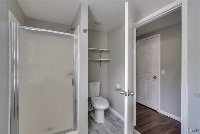 15243 Factory St, Clayton, NY 13632 - bathroom with a shower stall and wood finished floors