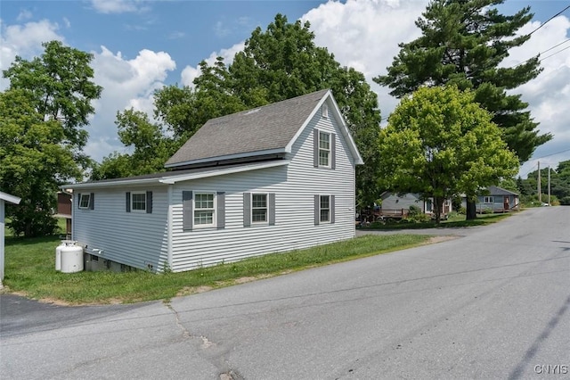 15243 Factory St, Clayton, NY 13632 - view of home's exterior with a shingled roof