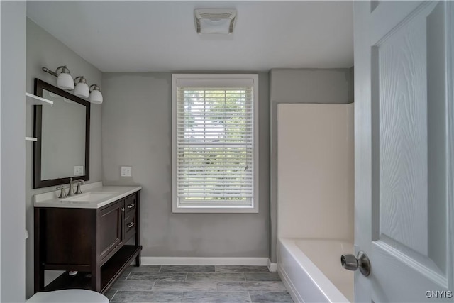 15243 Factory St, Clayton, NY 13632 - full bathroom featuring vanity and baseboards