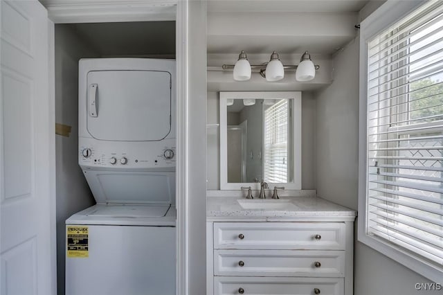 15243 Factory St, Clayton, NY 13632 - laundry area with stacked washer / drying machine