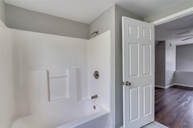 15243 Factory St, Clayton, NY 13632 - bathroom with wood finished floors and  shower combination