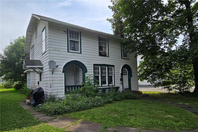 559 Maple Ave, Elmira City, NY 14904 - view of front facade featuring a front yard
