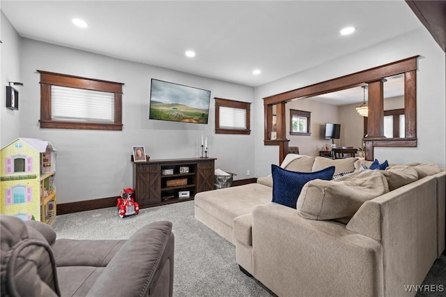 144 Whitfield Ave, Buffalo, NY 14220 - carpeted living area with healthy amount of natural light, recessed lighting, and a chandelier
