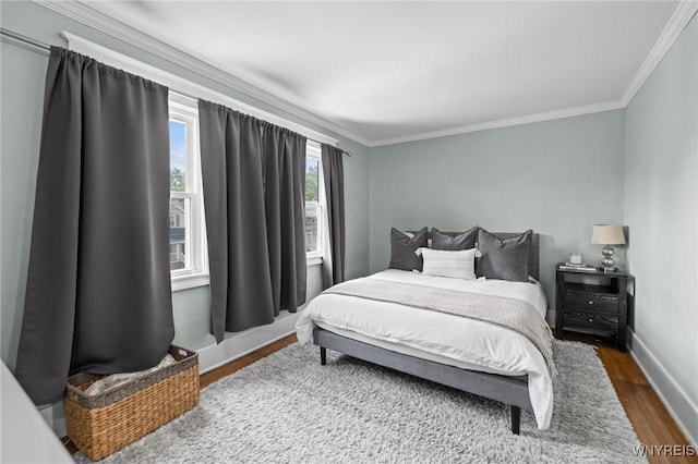 144 Whitfield Ave, Buffalo, NY 14220 - bedroom with ornamental molding and wood finished floors