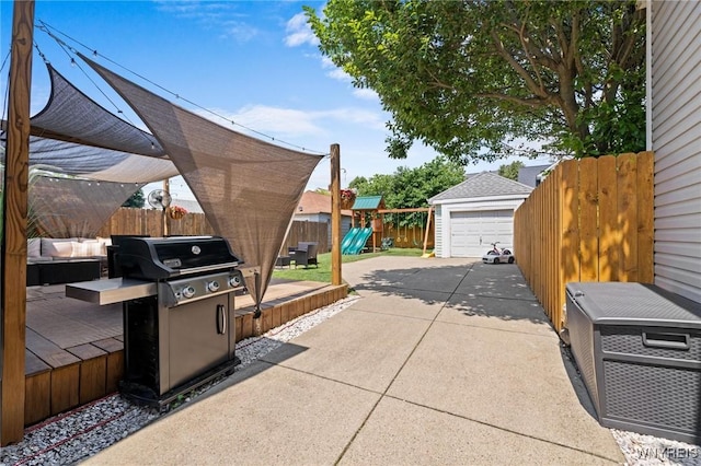 144 Whitfield Ave, Buffalo, NY 14220 - view of patio / terrace featuring a playground, a grill, an outdoor structure, and a detached garage