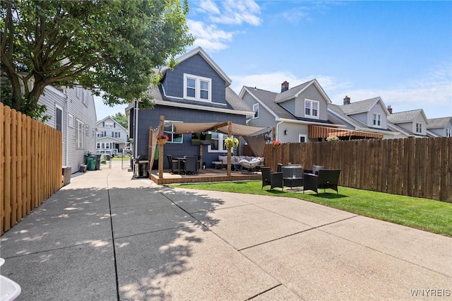 144 Whitfield Ave, Buffalo, NY 14220 - rear view of property with a residential view, a deck, a patio area, and outdoor dining area