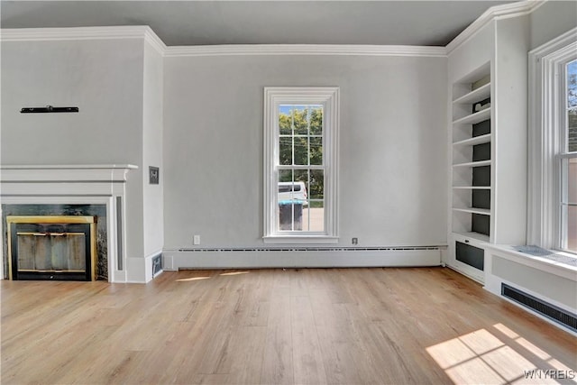 10470 Main St, North Collins, NY 14111 - unfurnished living room featuring built in features, wood finished floors, a fireplace, ornamental molding, and baseboard heating
