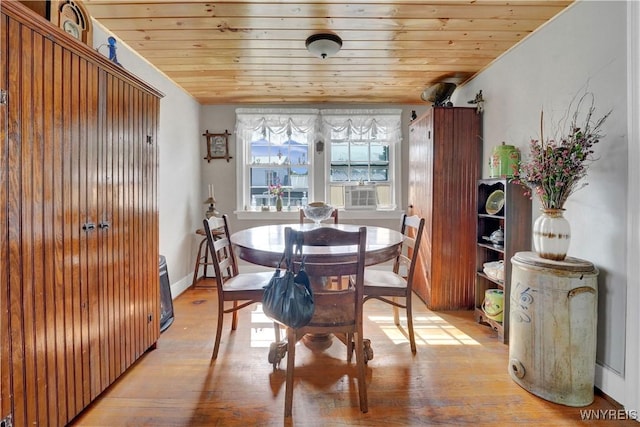 10470 Main St, North Collins, NY 14111 - dining area with light wood-style floors, wooden ceiling, and cooling unit