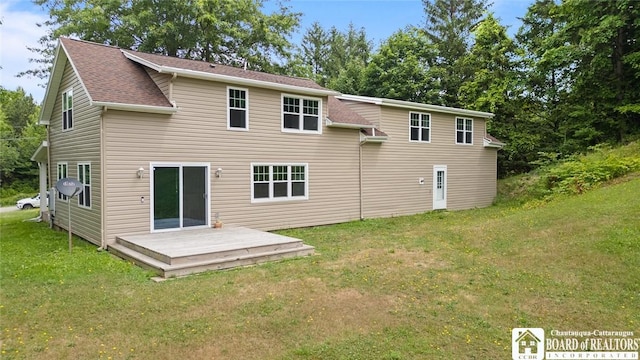 2777 S Roberts Rd, Sheridan, NY 14063 - back of house featuring a wooden deck, a lawn, and a shingled roof