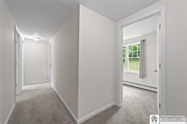 2777 S Roberts Rd, Sheridan, NY 14063 - corridor with baseboard heating and carpet
