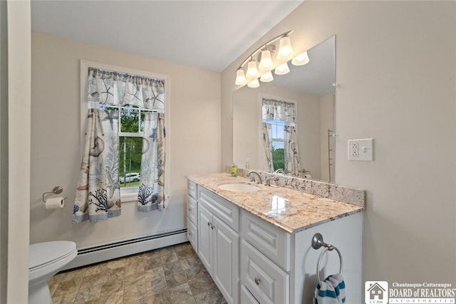 2777 S Roberts Rd, Sheridan, NY 14063 - bathroom featuring baseboard heating and vanity