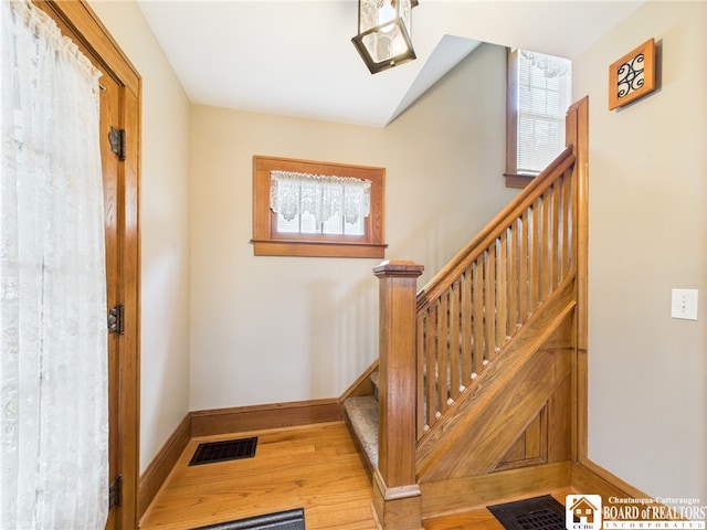 118 N 3rd St, Allegany, NY 14706 - stairway featuring baseboards and wood finished floors