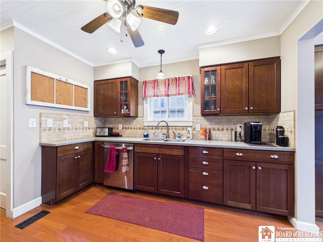 118 N 3rd St, Allegany, NY 14706 - kitchen with dishwasher, light countertops, light wood-style flooring, crown molding, and recessed lighting