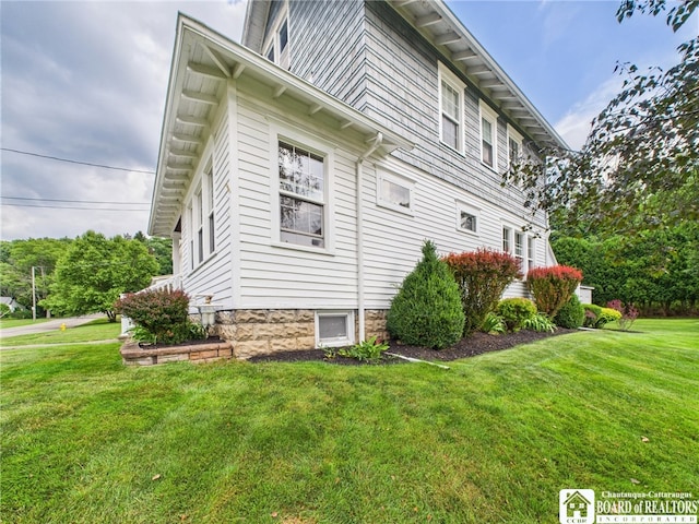 118 N 3rd St, Allegany, NY 14706 - view of property exterior featuring a yard