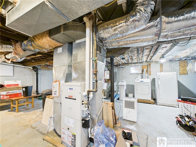 118 N 3rd St, Allegany, NY 14706 - basement featuring freestanding refrigerator, washer and clothes dryer, and heating unit