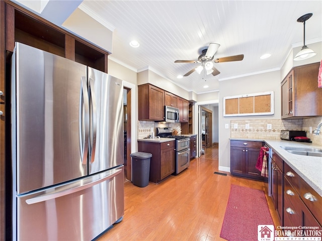 118 N 3rd St, Allegany, NY 14706 - kitchen with stainless steel appliances, ornamental molding, ceiling fan, light wood finished floors, and tasteful backsplash