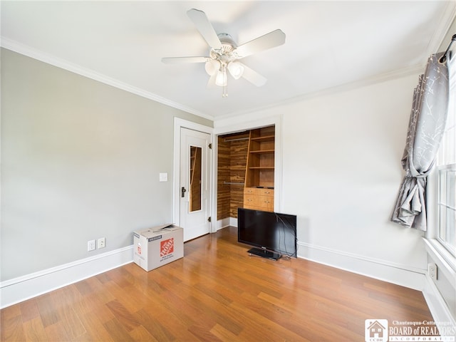 118 N 3rd St, Allegany, NY 14706 - unfurnished bedroom featuring crown molding, wood finished floors, and a ceiling fan