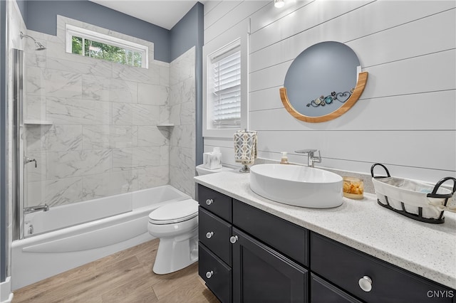 8873 Salvatore Ave, Lysander, NY 13027 - bathroom featuring vanity, shower / washtub combination, and wood finished floors