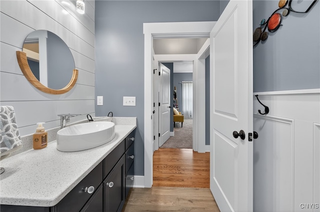 8873 Salvatore Ave, Lysander, NY 13027 - bathroom with wood finished floors and vanity