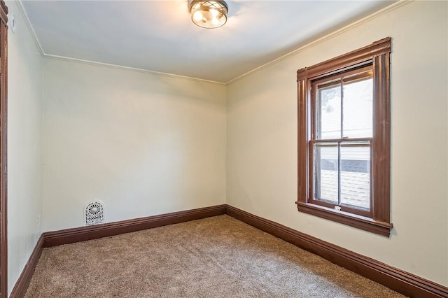9 Englert St, Rochester, NY 14605 - carpeted empty room with plenty of natural light and ornamental molding