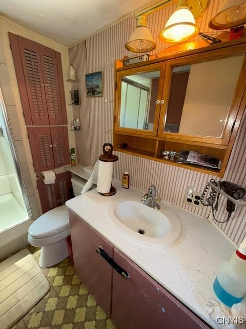 6792 Creek Rd, Lincoln, NY 13421 - bathroom featuring vanity and a shower