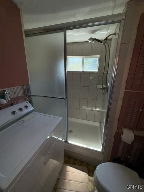 6792 Creek Rd, Lincoln, NY 13421 - bathroom featuring washer / clothes dryer and a stall shower