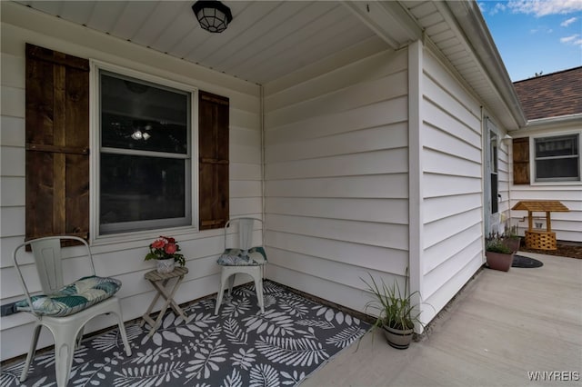 2610 Coomer Rd, Newfane, NY 14028 - property entrance with a shingled roof
