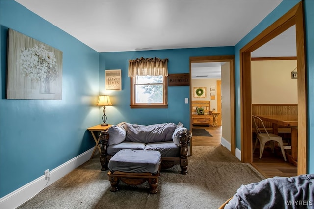 2610 Coomer Rd, Newfane, NY 14028 - carpeted living room with baseboards