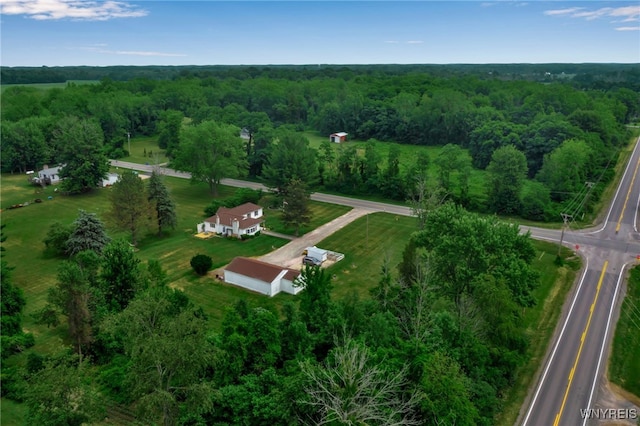 2610 Coomer Rd, Newfane, NY 14028 - aerial view of property and surrounding area featuring a heavily wooded area and rural landscape