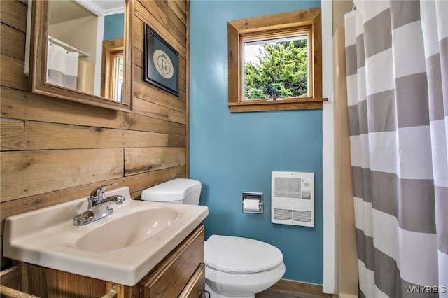 2610 Coomer Rd, Newfane, NY 14028 - bathroom with heating unit, wood walls, vanity, and a shower with curtain
