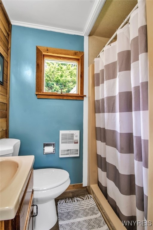 2610 Coomer Rd, Newfane, NY 14028 - bathroom featuring heating unit, vanity, wood finished floors, and a shower with shower curtain