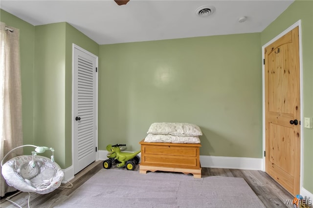 2610 Coomer Rd, Newfane, NY 14028 - bedroom with wood finished floors and a closet